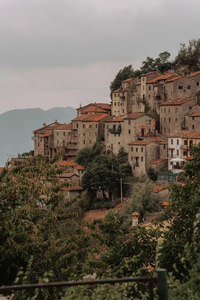 hillside village with terracotta roofs in Tuscany