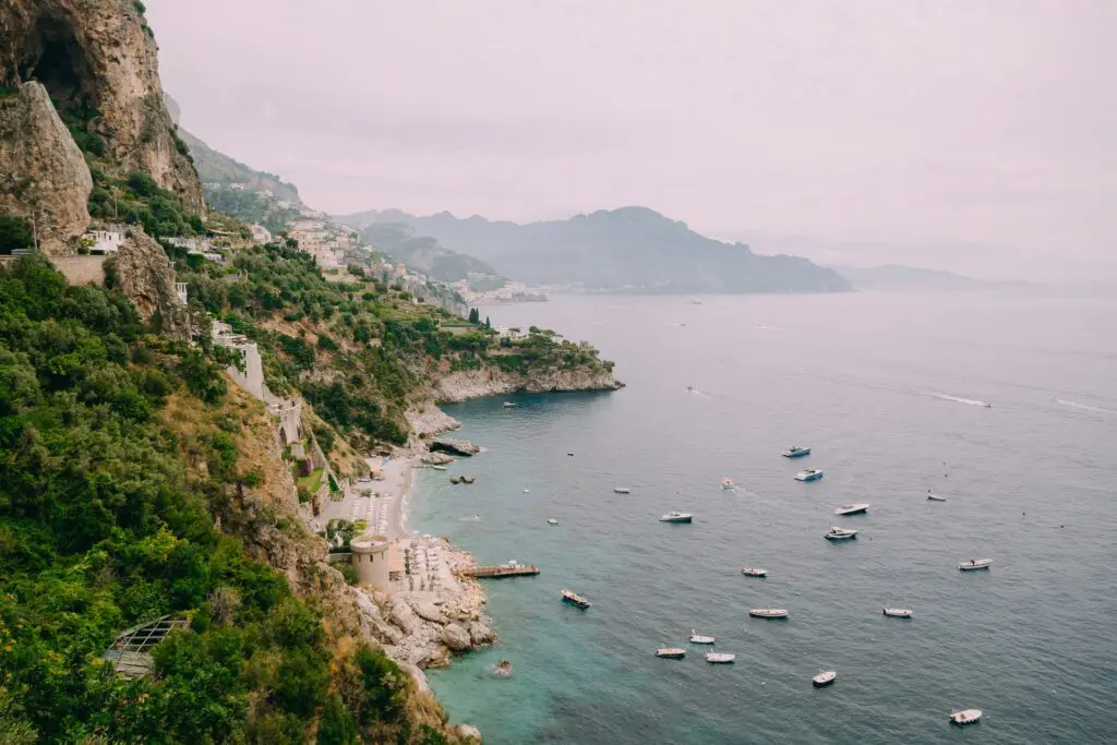 Amalfi Coast landscape with boats on the sea and coastal village