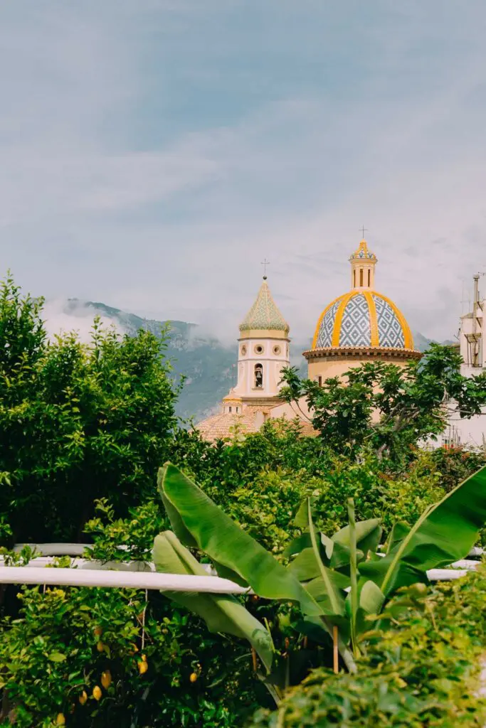 amalfi coast church domes and lush green foliage