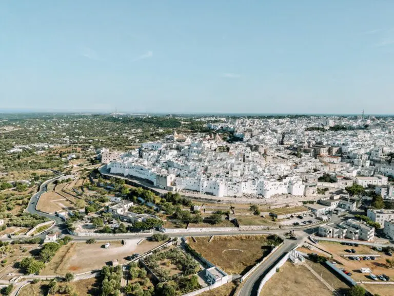 drone shot of Ostuni, the white city in Puglia, Italy