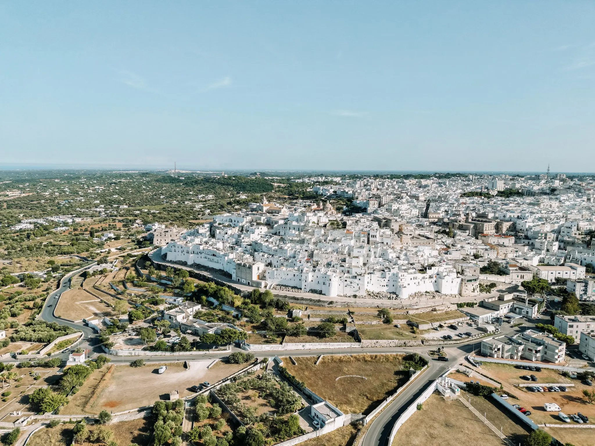 drone shot of Ostuni, the white city in Puglia, Italy